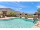 Enjoy the refreshing community pool with water features, beautiful landscaping, and mountain views at 36600 N Cave Creek Rd # 9B, Cave Creek, AZ 85331