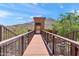 Exterior shot of an elevated walkway offering stunning views and access to community amenities at 36600 N Cave Creek Rd # 9B, Cave Creek, AZ 85331