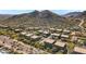 Stunning aerial view of modern homes nestled in a desert landscape with mountain views at 36600 N Cave Creek Rd # 9B, Cave Creek, AZ 85331