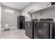 Clean laundry room with new washer and dryer at 36728 N Alderney Ct, San Tan Valley, AZ 85143