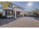 A gravel backyard provides a clean and low-maintenance space, with a covered patio for outdoor relaxation at 3816 E Phelps St, Gilbert, AZ 85295