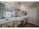 Bright ensuite bathroom featuring a long vanity with double sinks and generous mirror space at 3816 E Phelps St, Gilbert, AZ 85295