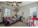 bedroom featuring a ceiling fan and fun decor at 3816 E Phelps St, Gilbert, AZ 85295