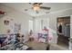 bedroom featuring a ceiling fan, closet, and fun decor at 3816 E Phelps St, Gilbert, AZ 85295