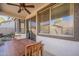 Patio area with a ceiling fan and a dining table with chairs at 3816 E Phelps St, Gilbert, AZ 85295