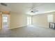 Bedroom features include neutral carpeting, a ceiling fan, and a sliding glass door to the backyard at 4582 E Jadeite Dr, San Tan Valley, AZ 85143