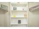 White storage closet with adjustable shelving for organization and personal items at 4582 E Jadeite Dr, San Tan Valley, AZ 85143