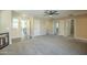 Spacious living room featuring neutral carpet and an open floor plan leading to other rooms at 4582 E Jadeite Dr, San Tan Valley, AZ 85143