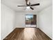 Inviting bedroom featuring a ceiling fan and sliding door access to the outdoor at 540 N May -- # 3131, Mesa, AZ 85201