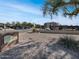 Exterior shot of the community grounds, landscaping, parking, and building exteriors on a sunny day at 540 N May -- # 3131, Mesa, AZ 85201