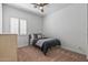 Bedroom with carpet, shuttered window and closet at 7329 W Tether Trl, Peoria, AZ 85383