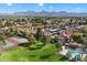 Aerial view of lush landscaping, community amenities, and surrounding buildings in an apartment community at 9445 N 94Th Pl # 212, Scottsdale, AZ 85258