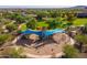 Aerial view of community playground with shade structures, sand pit, and desert landscaping at 12711 W Lowden Rd, Peoria, AZ 85383