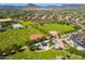 Aerial view of community park with baseball fields, playground, green spaces, and desert landscape at 12711 W Lowden Rd, Peoria, AZ 85383