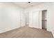 Empty bedroom with access to closet and bathroom at 12711 W Lowden Rd, Peoria, AZ 85383