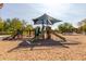 Shaded playground with multiple slides and climbing structures on a safe surface at 12711 W Lowden Rd, Peoria, AZ 85383