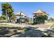 Community playground featuring shade structures, slides, and climbing equipment for outdoor fun at 15218 N 37Th Ave, Phoenix, AZ 85053