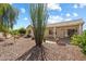 Desert landscaped backyard, perfect for low-maintenance living at 17661 N Saddle Ridge Dr, Surprise, AZ 85374