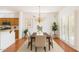 Sunlit dining area boasts a chandelier, shutters, and seamless flow to adjacent spaces at 17661 N Saddle Ridge Dr, Surprise, AZ 85374