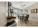 Dining area filled with natural light and a wine storage unit at 18102 N Petrified Forest Dr, Surprise, AZ 85374