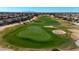 Expansive view of the golf course, highlighting the manicured greens and scenic fairways in this active community at 18102 N Petrified Forest Dr, Surprise, AZ 85374