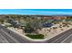 An aerial shot of the Village Center and the many surrounding palm trees of the complex at 18102 N Petrified Forest Dr, Surprise, AZ 85374