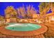 Inviting backyard showcasing a pool with inset steps, mature landscaping, and a peaceful outdoor retreat at 188 E Mountain View Rd, San Tan Valley, AZ 85143