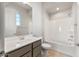 Bathroom with combined tub and shower, updated vanity, and tiled floor at 26903 W Renee Dr, Buckeye, AZ 85396