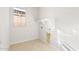 Clean and functional laundry room with ample space and natural light at 26903 W Renee Dr, Buckeye, AZ 85396