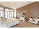 Tranquil bedroom features a light-colored bed, white furniture, and plenty of natural light at 301 E Ashurst Dr, Phoenix, AZ 85048