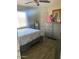 Bedroom featuring a bed, window, and dresser at 3431 W Campbell Ave, Phoenix, AZ 85017