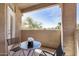 Balcony with patio furniture offering views of the surrounding greenery at 3830 E Lakewood Pkwy # 3164, Phoenix, AZ 85048