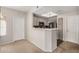 Bright kitchen featuring a breakfast bar and stainless steel appliances at 3830 E Lakewood Pkwy # 3164, Phoenix, AZ 85048