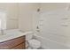 Bathroom featuring a shower-tub combo and vanity with solid surface counter at 3911 S 100Th Gln, Tolleson, AZ 85353