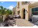 Cozy front patio featuring a paved area with patio furniture and a charming entryway at 4077 S Sabrina Dr # 23, Chandler, AZ 85248