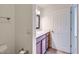 A light and airy bathroom with a vanity, a white door and tile flooring at 4354 N 82Nd St # 182, Scottsdale, AZ 85251