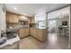 Bright kitchen with light wood cabinets, tile floors, and neutral countertops providing an inviting space at 5429 N 78Th St, Scottsdale, AZ 85250