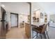 Modern kitchen view with breakfast bar and stainless steel appliances at 5429 N 78Th St, Scottsdale, AZ 85250