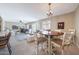 Open-concept living space featuring tile floors, neutral decor, and comfortable seating at 5429 N 78Th St, Scottsdale, AZ 85250