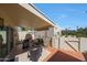 Spacious covered patio featuring brick pavers, tile flooring, and comfortable seating arrangements at 5429 N 78Th St, Scottsdale, AZ 85250