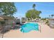 Inviting community pool featuring ample seating, shade, and pristine water for residents at 5429 N 78Th St, Scottsdale, AZ 85250