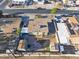 Aerial view displaying a residential property with a shed, a basketball hoop, and convenient street parking at 6627 W Keim Dr, Glendale, AZ 85301