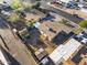 Aerial view showing a fenced yard, a storage shed, and convenient street parking in a residential neighborhood at 6627 W Keim Dr, Glendale, AZ 85301