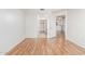 Vacant bedroom with wood floor shows the entrance to the bathroom and the closet at 6770 N 47Th Ave # 1022, Glendale, AZ 85301