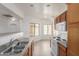 Well-lit kitchen boasts ample natural light, stainless steel sink and breakfast bar at 6770 N 47Th Ave # 1022, Glendale, AZ 85301