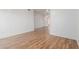 Open living area with hardwood floors, neutral walls, leading to other rooms at 6770 N 47Th Ave # 1022, Glendale, AZ 85301