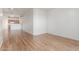 Empty living room with hardwood floors, neutral walls, and ample space at 6770 N 47Th Ave # 1022, Glendale, AZ 85301