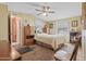 Bedroom with carpet, and neutral walls and trim. The ceiling fan is a great addition at 701 S Dobson Rd # 432, Mesa, AZ 85202