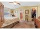 Bright bedroom featuring carpet and light walls. There is an en-suite bath, and a walk-in closet at 701 S Dobson Rd # 432, Mesa, AZ 85202