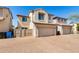 Charming stucco townhome with a two-car garage and fenced entry, offering privacy at 8429 W Vernon Ave, Phoenix, AZ 85037